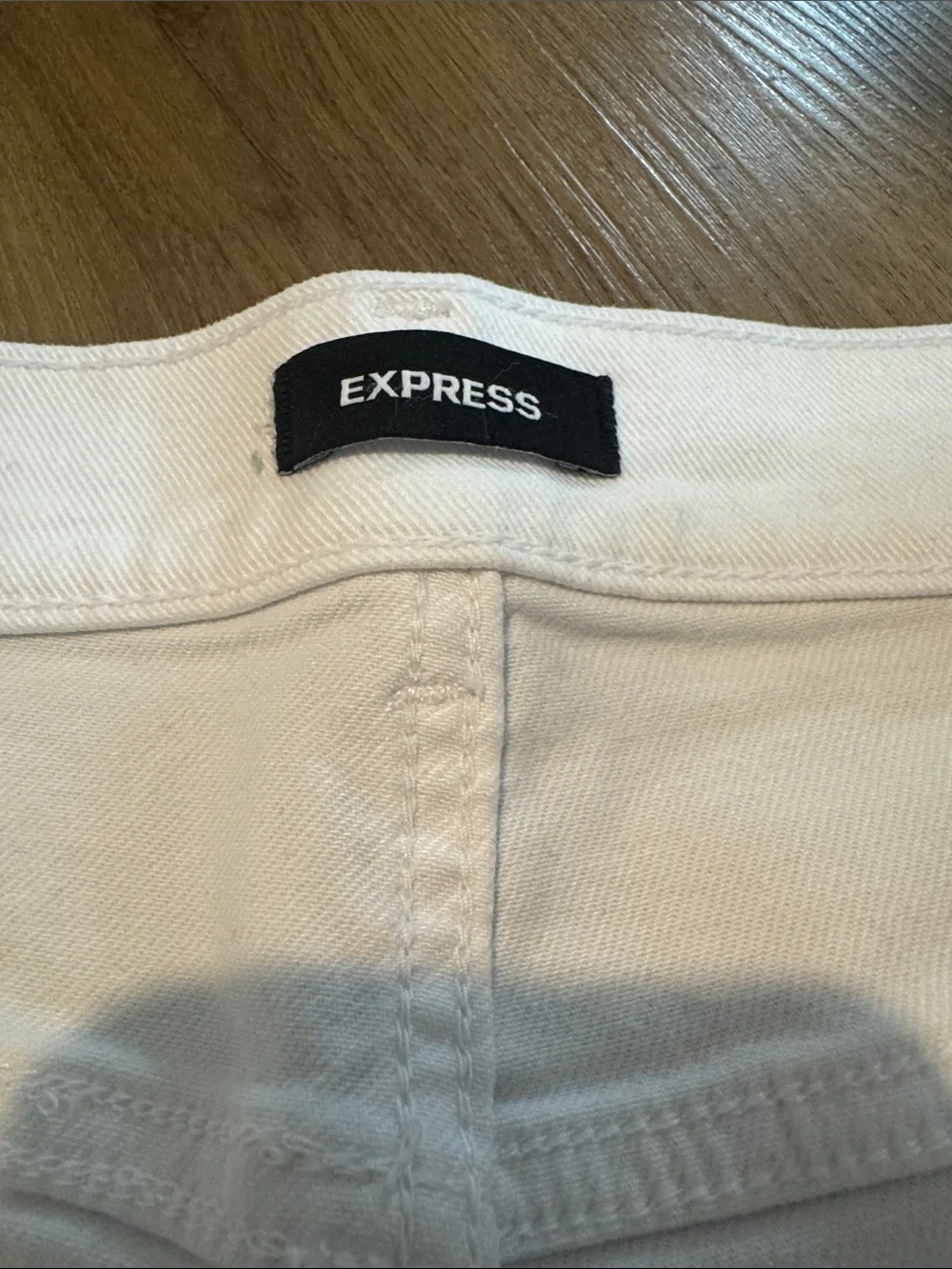 Express White Denim Shorts with Raw Hem